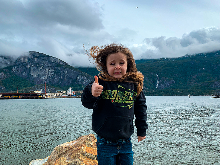 Young angler in truck bed